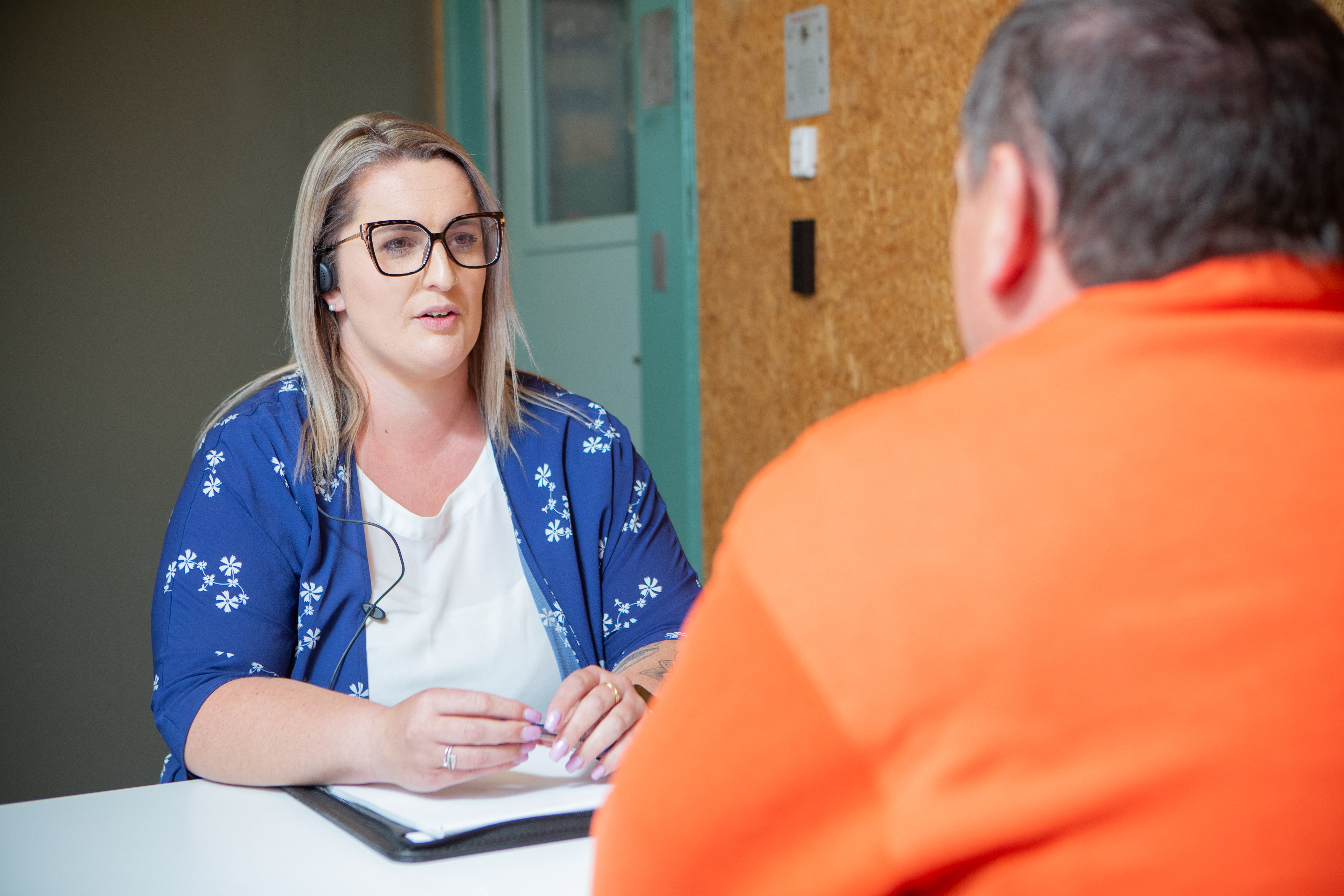 Case manager having a meeting with a person in prison