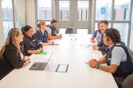 Different teams meet for a discussion